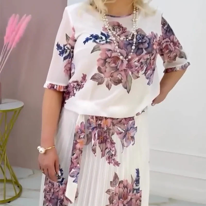 Abito da donna plissettato con motivo floreale