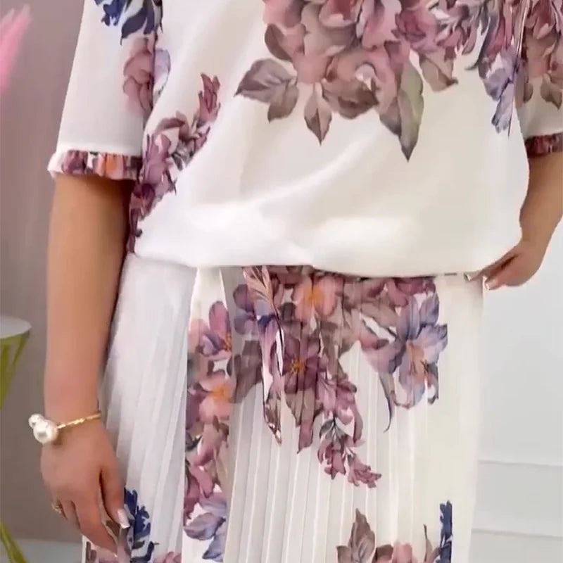 Abito da donna plissettato con motivo floreale