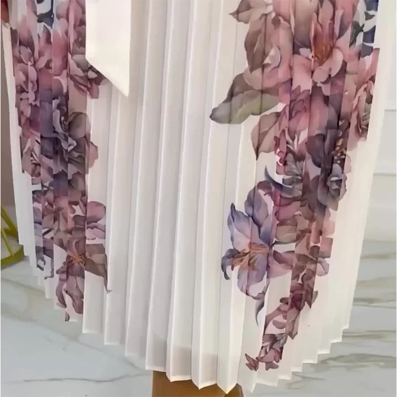Abito da donna plissettato con motivo floreale