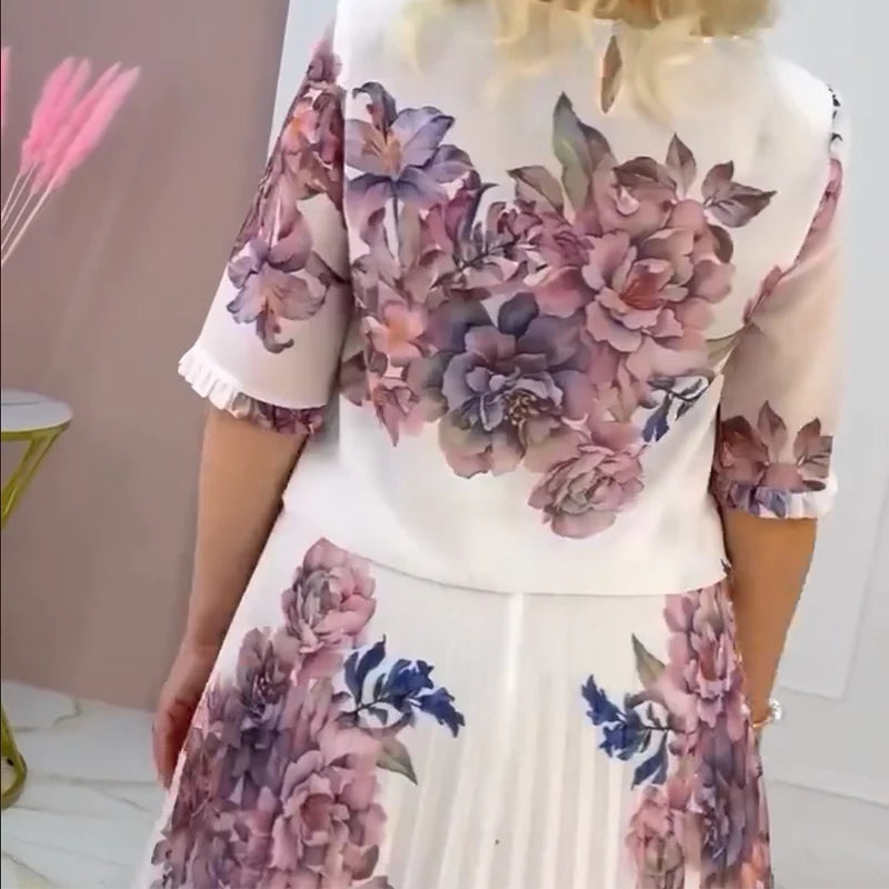 Abito da donna plissettato con motivo floreale