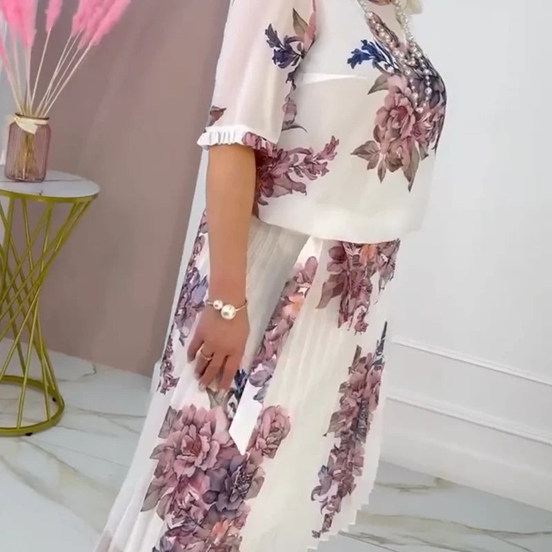 Abito da donna plissettato con motivo floreale